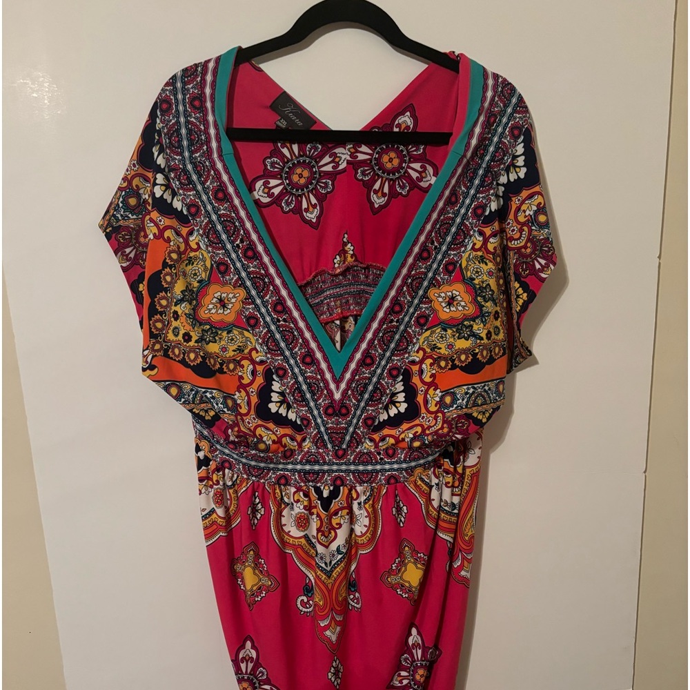 Women’s mid length dress. Plunging neckline.  Empire waist very soft fabric